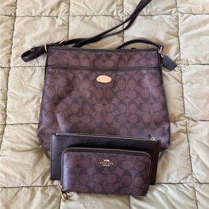 3 piece Coach Brown Monogram Shoulder Bag & 2 wallets like new condition.